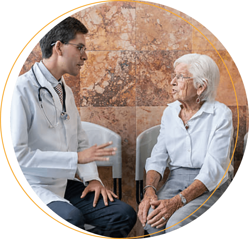 healthcare provider discussing parkinson's disease with a patient