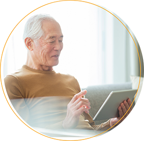 Elderly man using a digital tablet