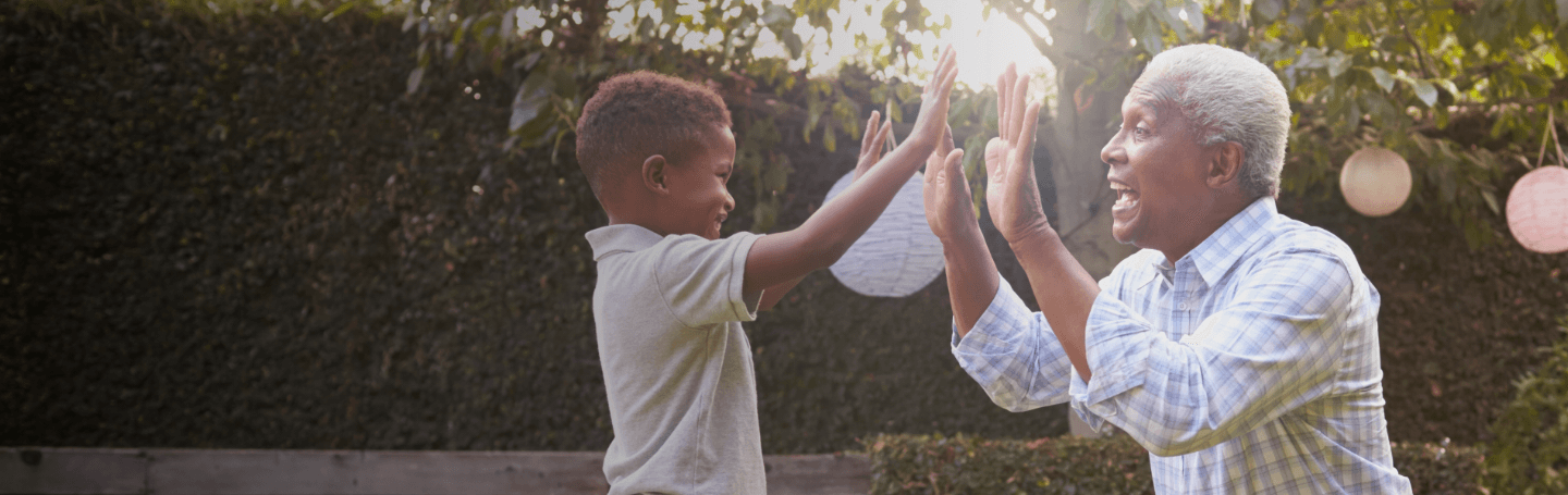 Grandfather and grandchild High five