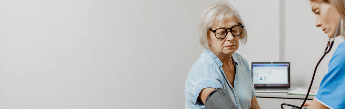 Parkinson's patient having her vitals taken